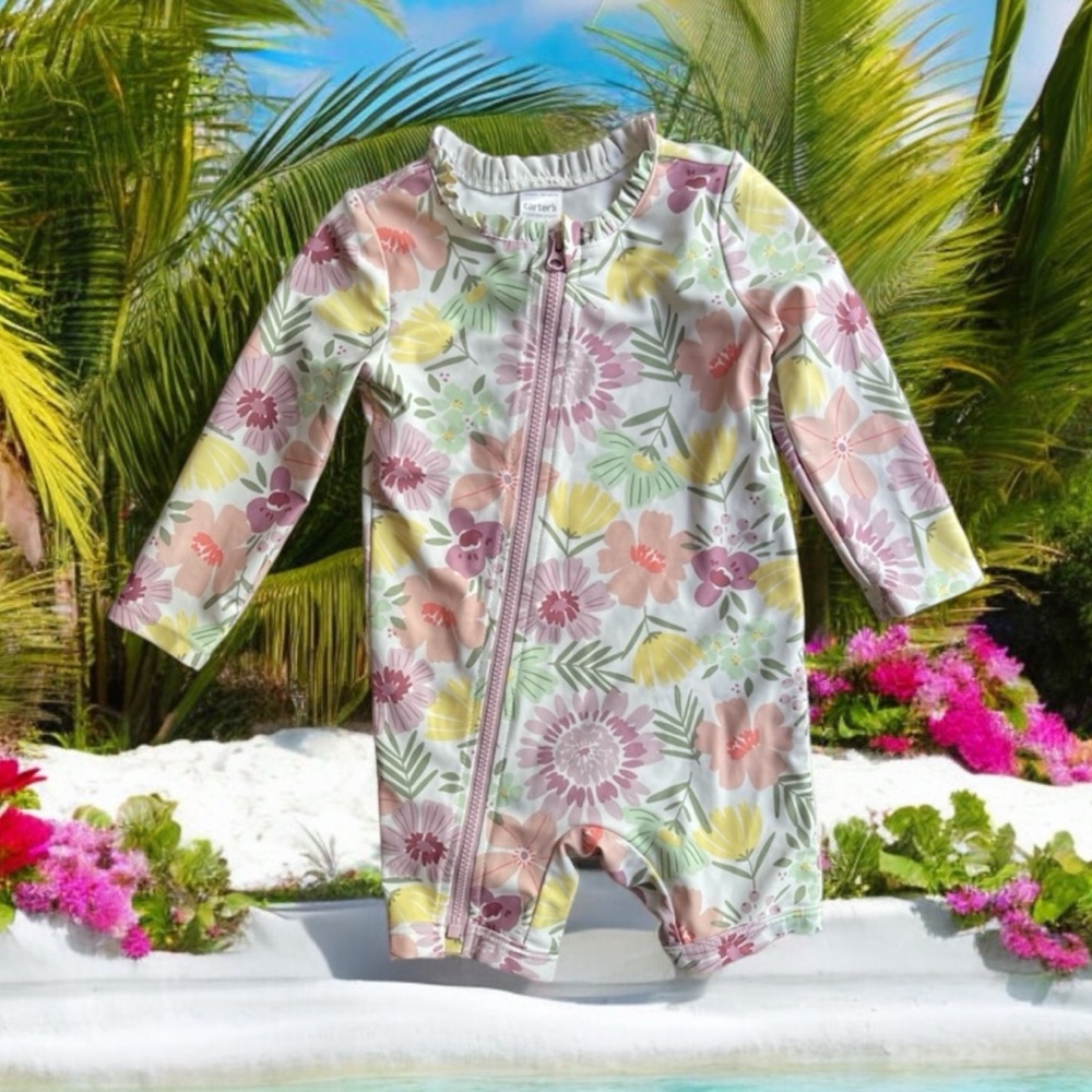 9 month long sleeve/zipper swimsuit by Cat & Jack. Floral print.
